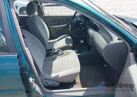 1997 Ford Escort Lx z USA, uszkodzony, nr VIN 1FALP13P8VW184766